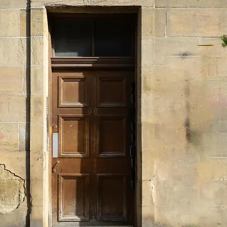 The Eden Apartment, Center