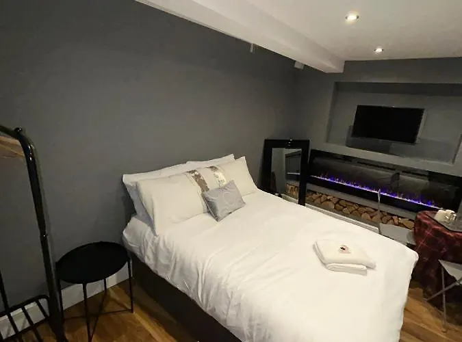 Cosy Double Bed With Fire Place