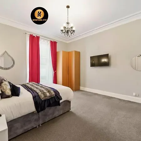 Апартаменты Lovely 4 Bedroom With 7 Beds And Free Parking