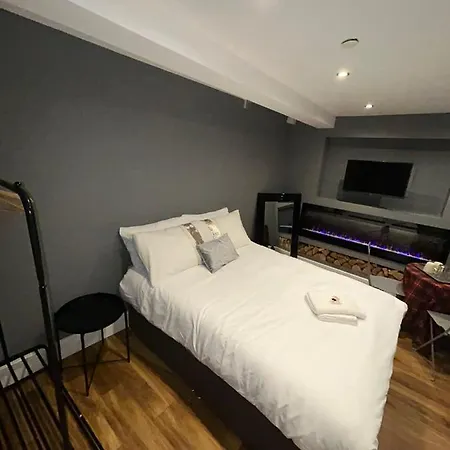 Cosy Double Bed With Fire Place