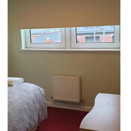 Quarto em Acomodações Particulares Double 2 Single Beds